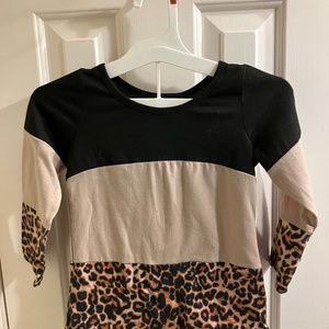 Girls colorblock, cheetah print long sleeve top.